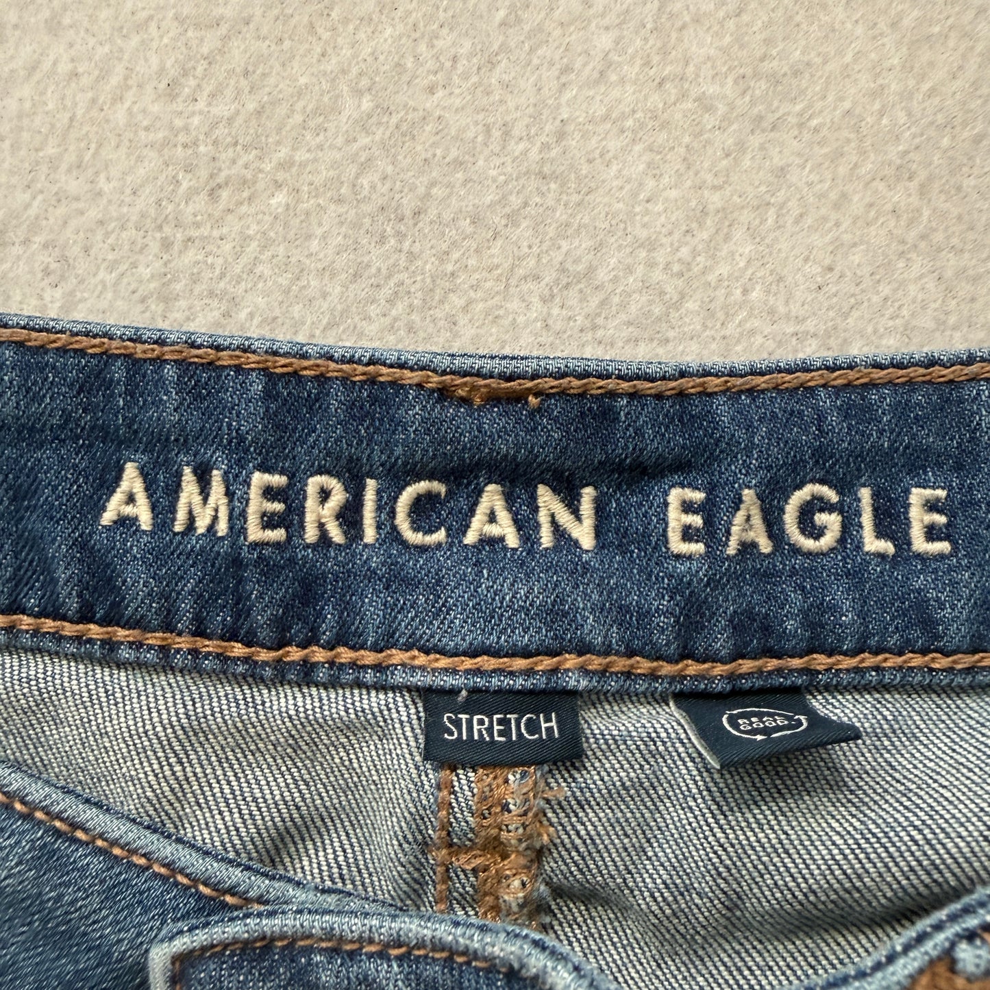 American Eagle Women's Blue Flared Denim Jeans Ripped Knees Stretch Size W34