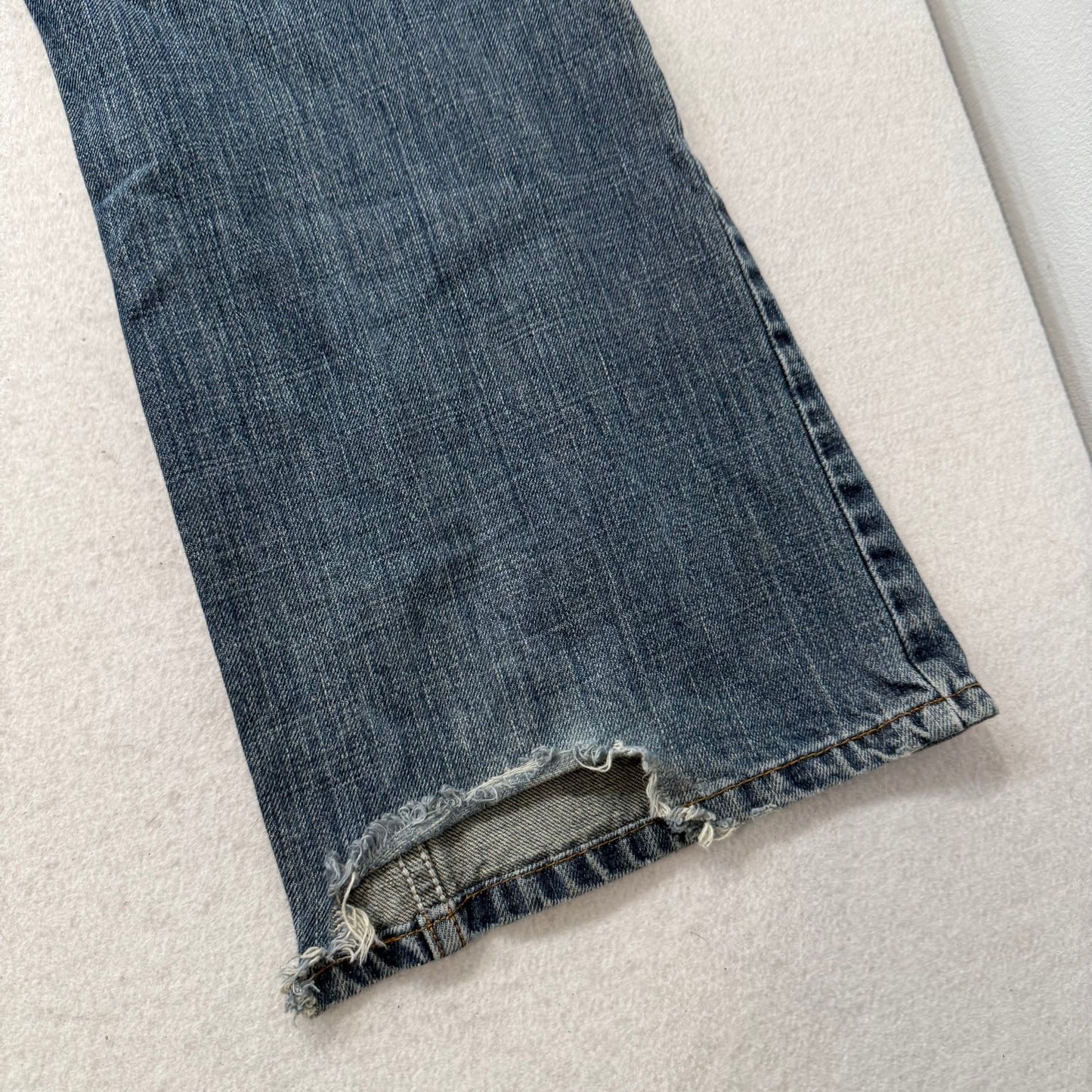 Levi's Strauss & Co. 527 Women's Blue Denim Low Bootcut Jeans Raw Hem Size 34