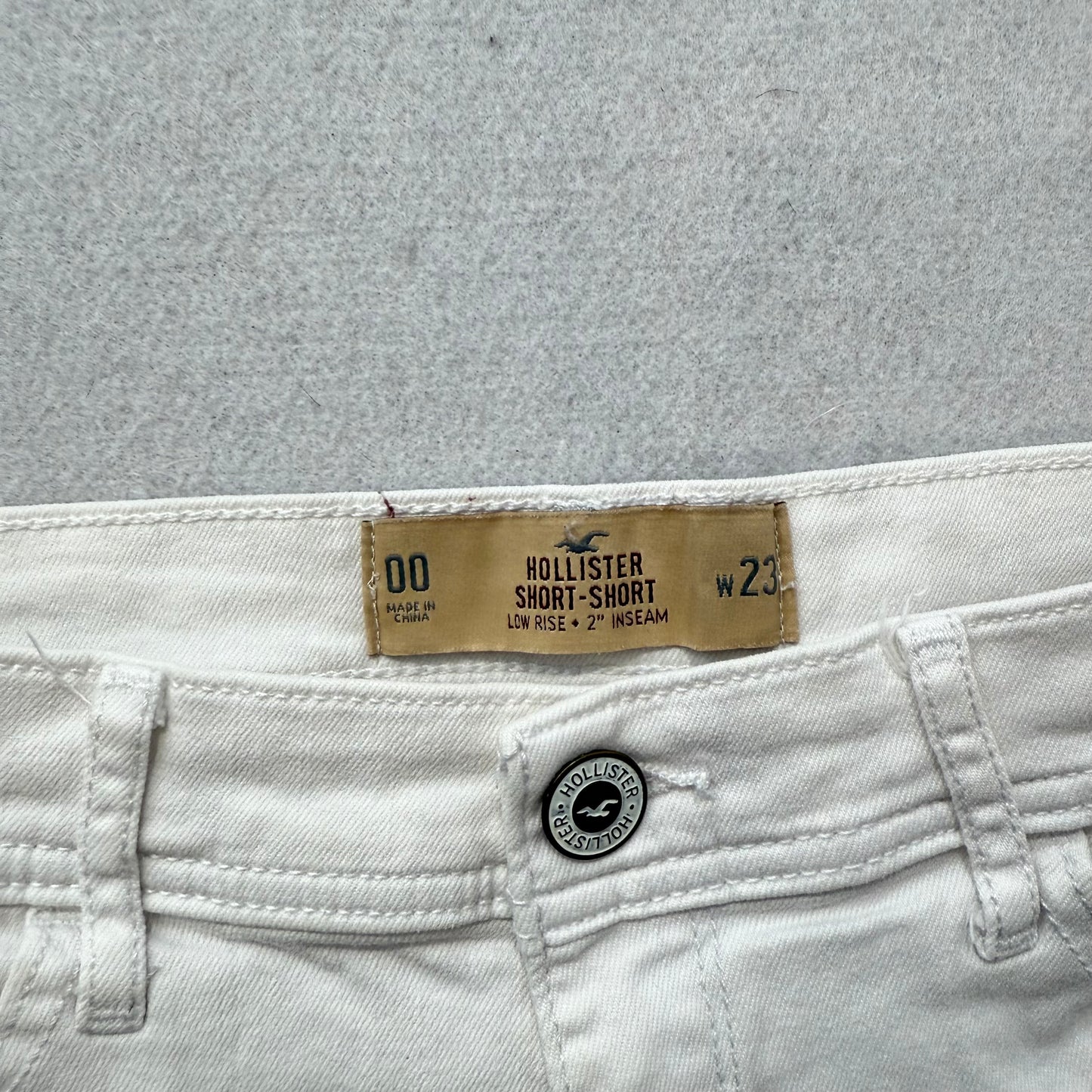 Hollister Womens White Denim Distressed Short-Shorts Low-Rise Frayed Hem Size 23