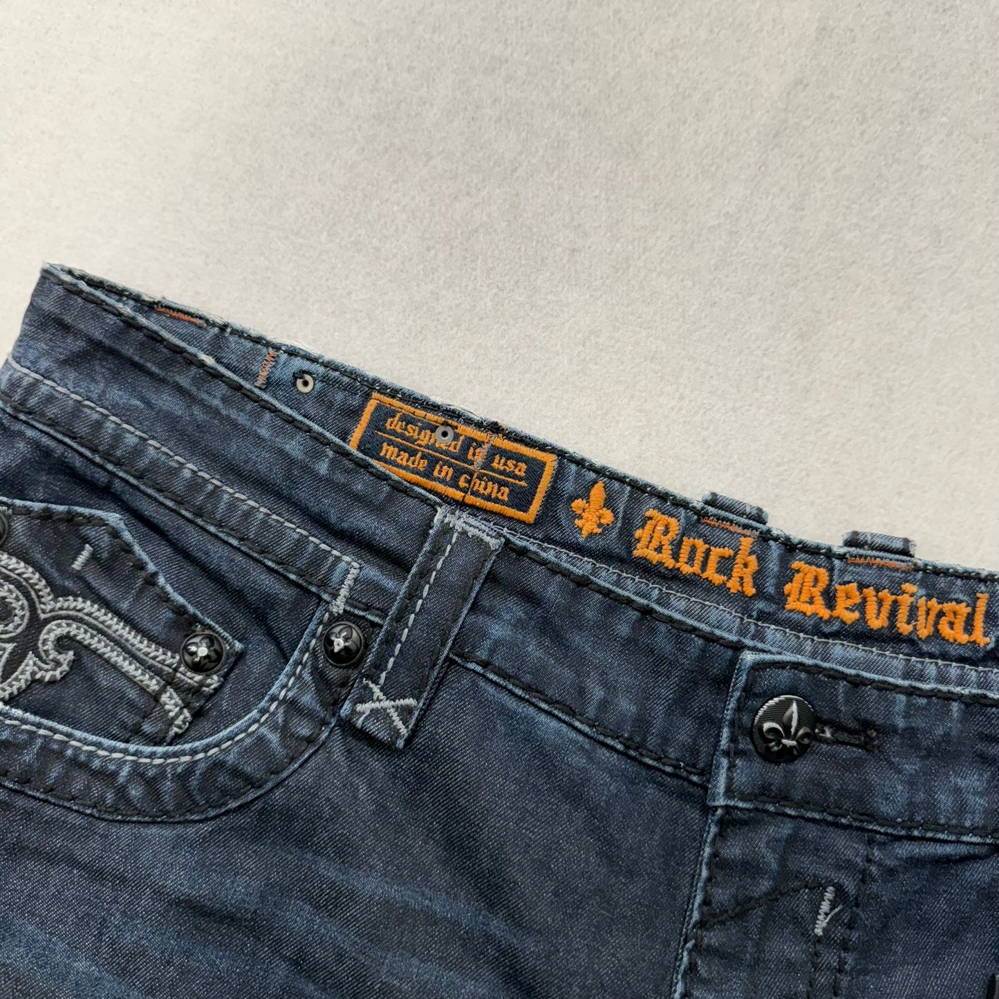 Rock Revival Leslie Dark Washed Indigo Denim Shorts Fleur-de-lis Pockets Size 42