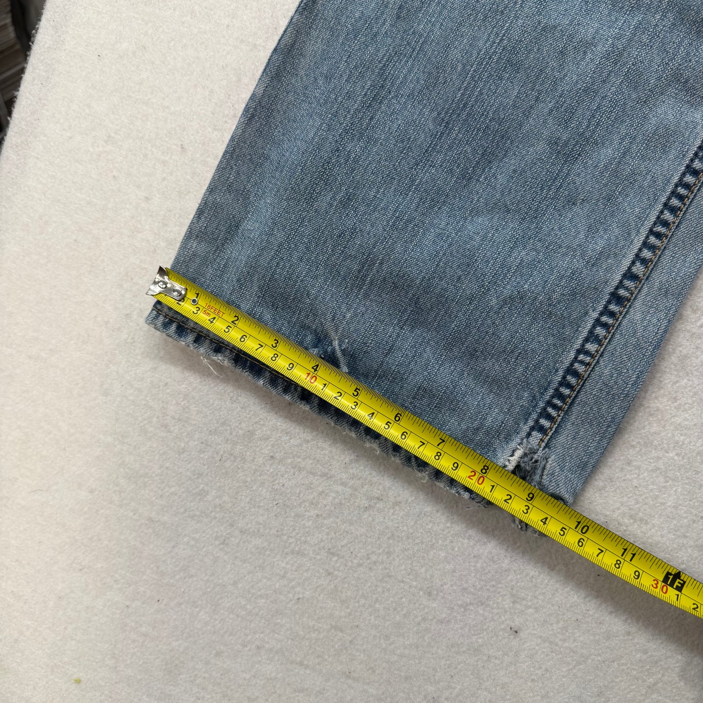 American Eagle Men's Light Wash Blue Denim Straight Leg Jeans Raw Hem Size 34