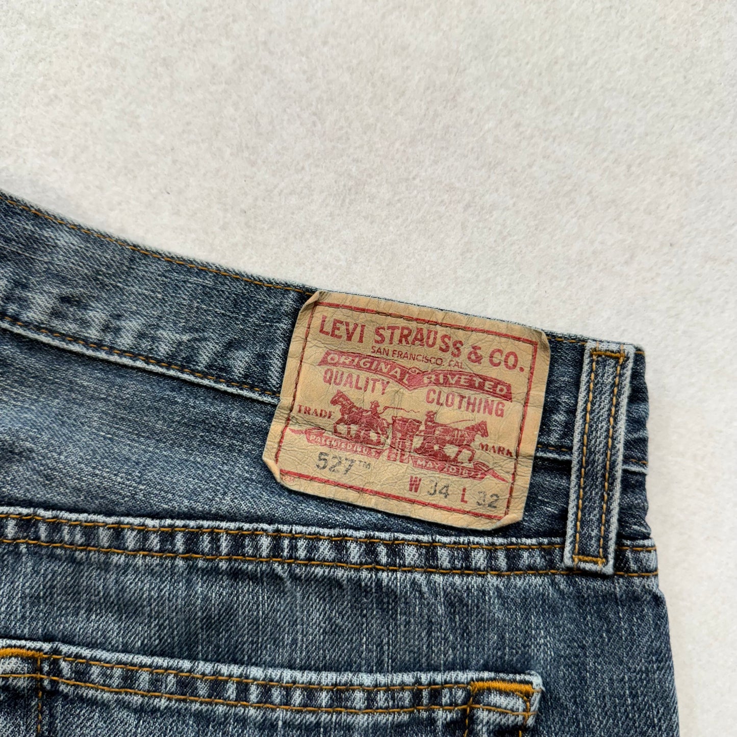 Levi's Strauss & Co. 527 Women's Blue Denim Low Bootcut Jeans Raw Hem Size 34