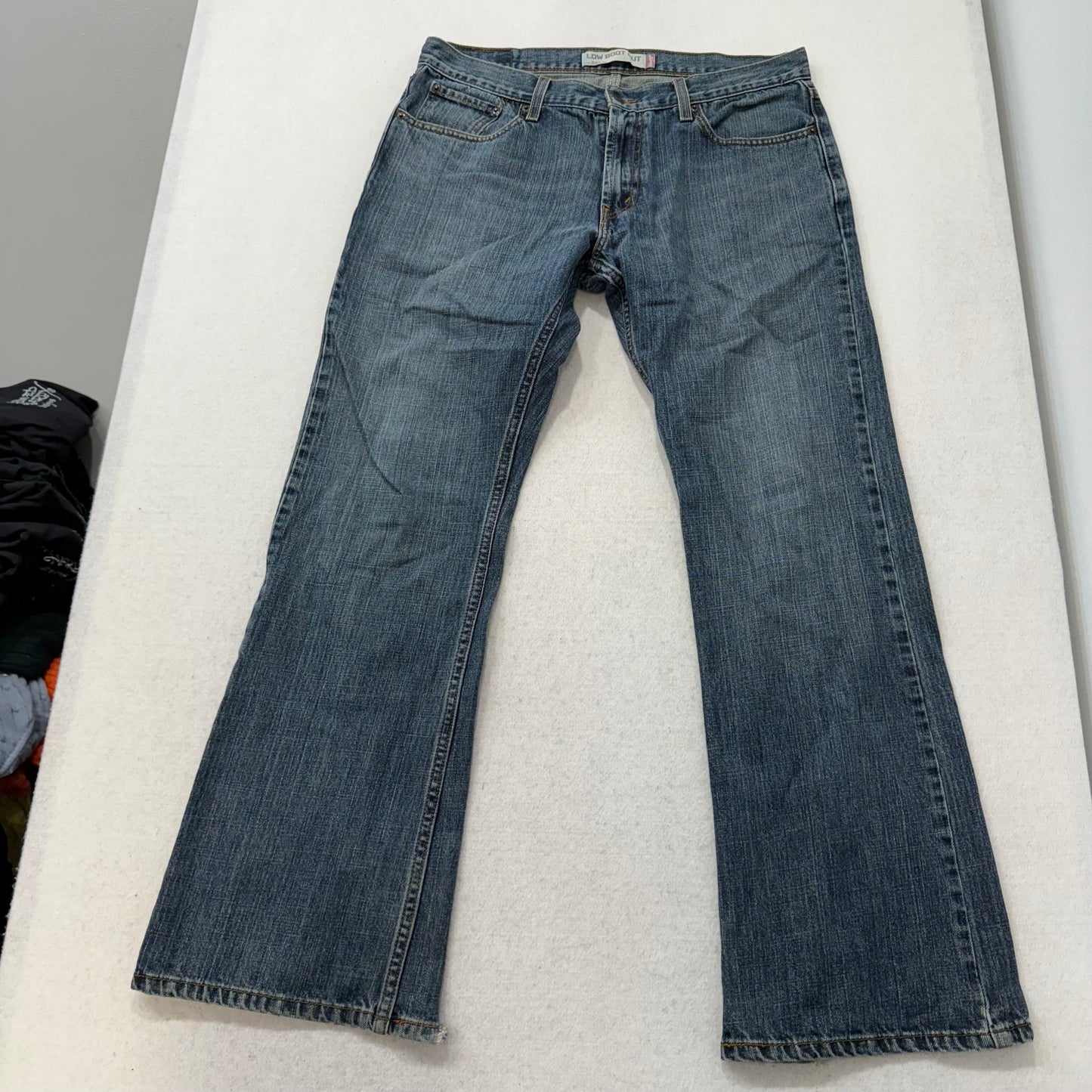 Levi's Strauss & Co. 527 Women's Blue Denim Low Bootcut Jeans Raw Hem Size 34