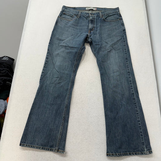 Levi's Strauss & Co. 527 Women's Blue Denim Low Bootcut Jeans Raw Hem Size 34