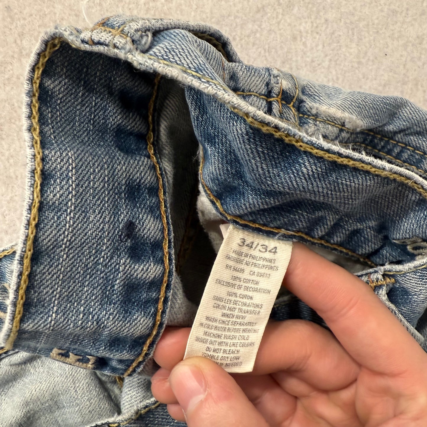American Eagle Men's Light Wash Blue Denim Straight Leg Jeans Raw Hem Size 34