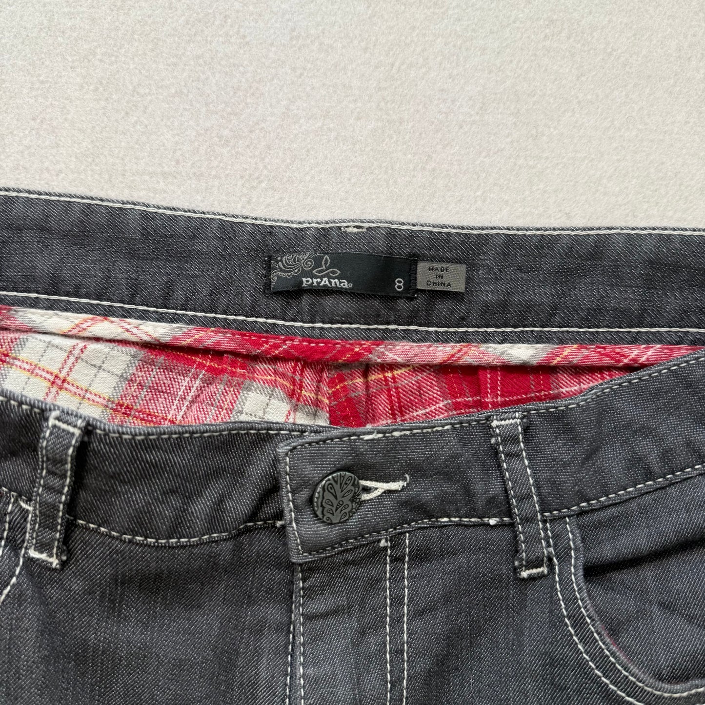 Prana washed dark grey denim jeans with front slant pockets and curved-stitched back patch pockets size 8